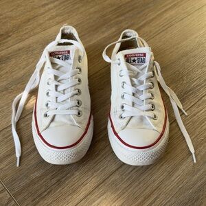 White Low Top Converse All-Star in good condition. A lot  more wear left